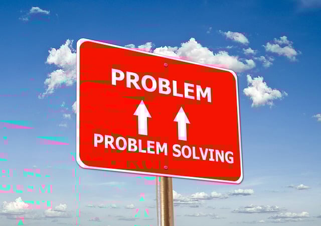 Picture of a signboard saying problem solving, indicating one of the reasons why people buy is to solve a problem 